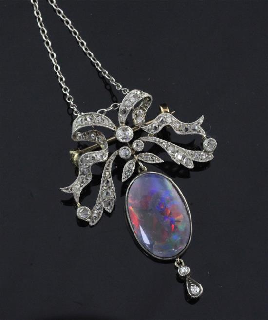 A Belle Epoque style gold, black opal and diamond drop brooch/pendant, now with a white metal chain, pendant approx. 1.75in.